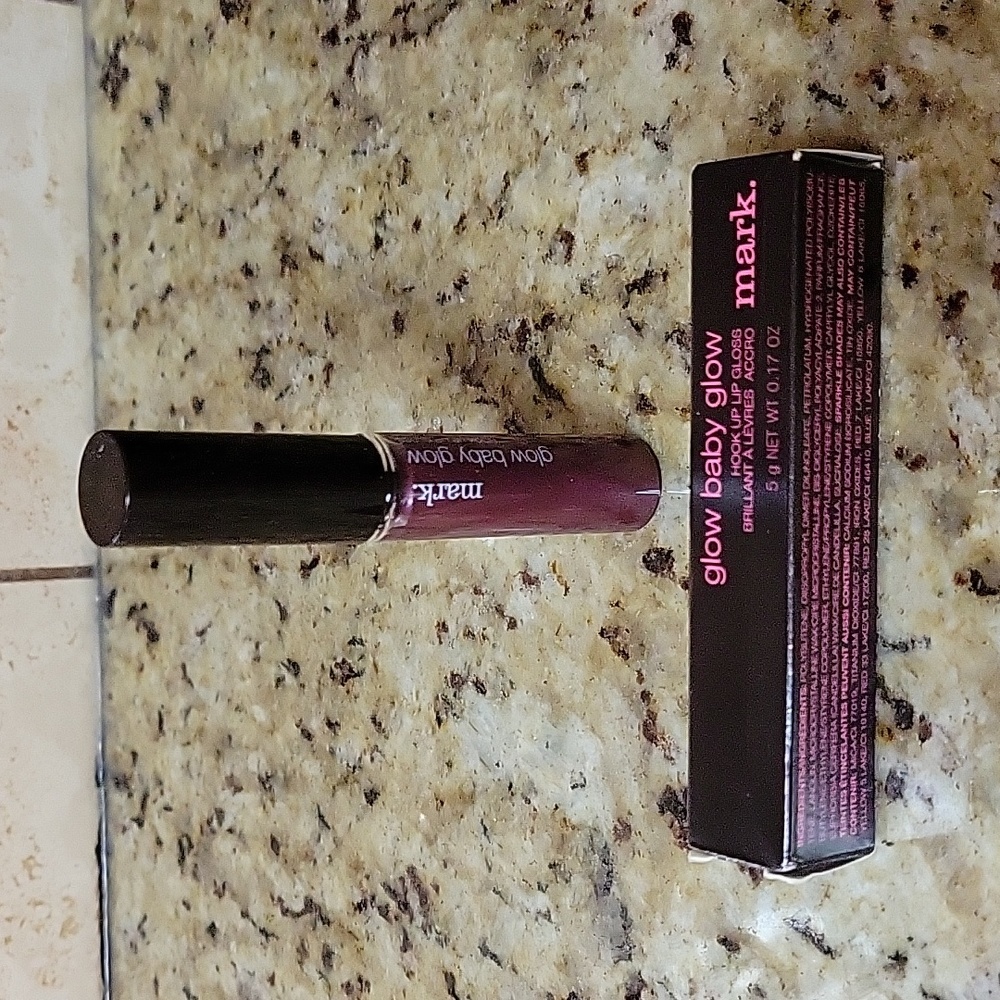 NEW MARK. LIP GLOSS WINED UP